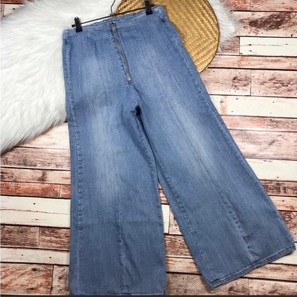 Wide leg high rise jeans with front exposed zipper